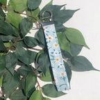 Light Blue Floral Print Wristlet - Fairway Faith Apparel Co